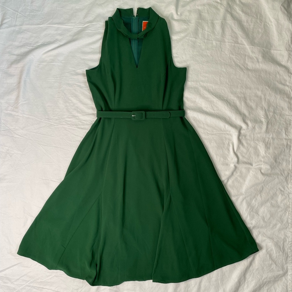 Modcloth cocktail dress in a deep green. 
Size M